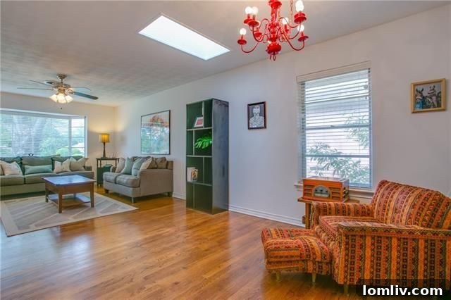 Low-maintenance pebble patio area, versatile for various uses