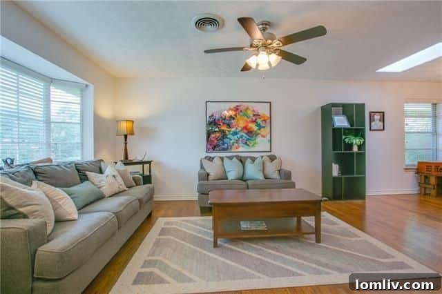 Close-up of the charming pink brick facade and stone hardscaping