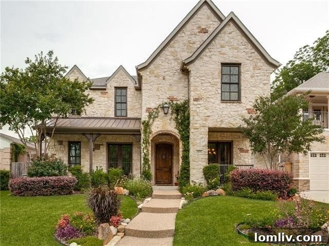 Charming M-Streets Tudor exterior with lush landscaping at 6035 Marquita Ave