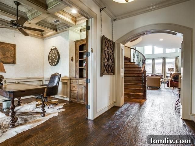 Inviting living room with Austin stone fireplace and hardwood floors