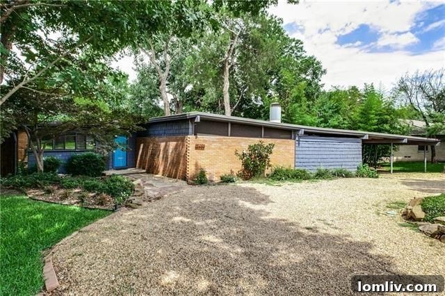 Classic Midcentury Modern exterior at 509 Hoel Dr with a well-maintained lawn