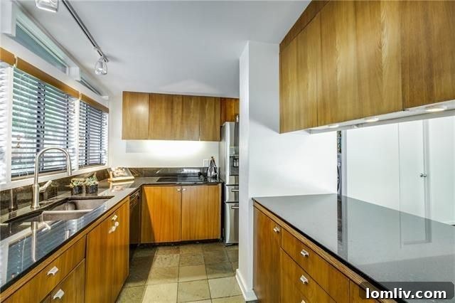 Inviting dining area next to large windows, ideal for natural light