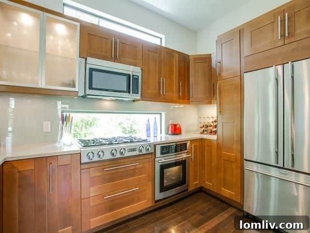 Bright open concept living area with hardwood floors