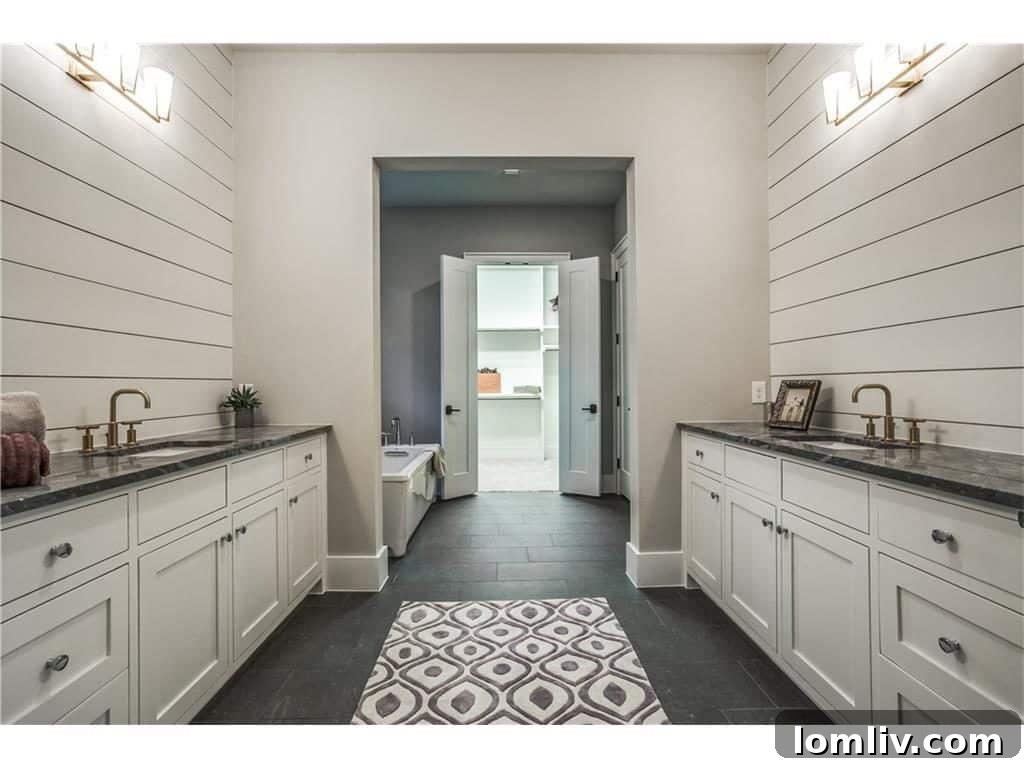 Cambridge Homes' M Streets Modern Farmhouse: Designed with HGTV Flair 11 Chic Modern Bathroom with Elegant Brass Fixtures