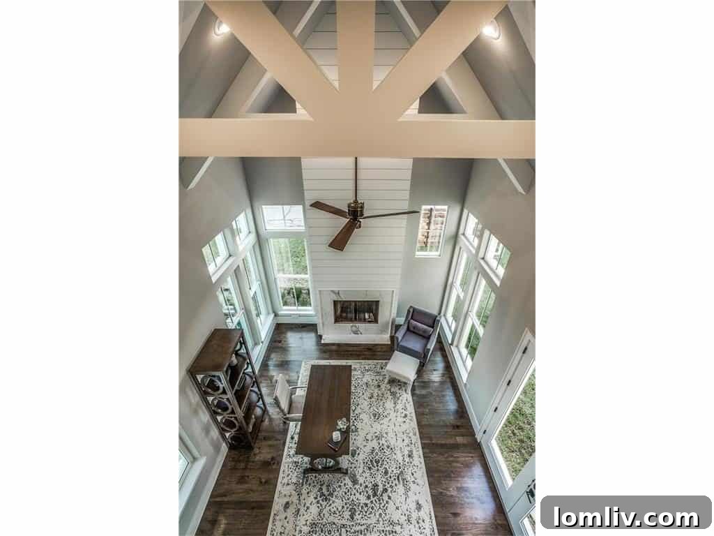 Cambridge Homes' M Streets Modern Farmhouse: Designed with HGTV Flair 7 Elegant Bathroom with Modern Brass Fixtures and Sophisticated Tiling