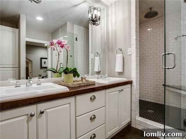 Architectural Excellence: Dallas Modern Townhome Tops Our Open House Guide 27 Luxurious master bathroom with oversized shower and jetted tub