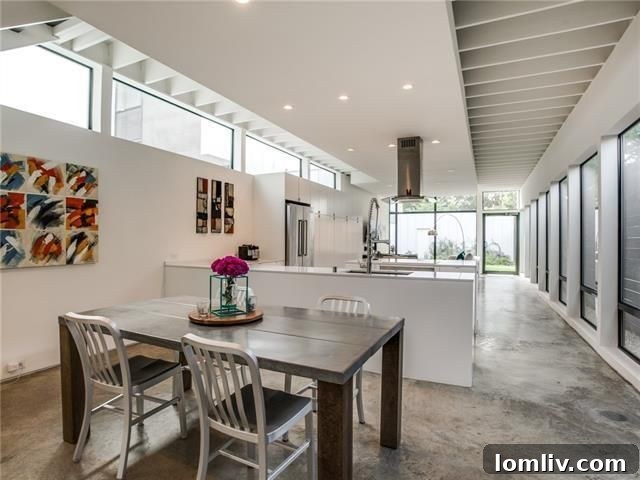 Architectural Excellence: Dallas Modern Townhome Tops Our Open House Guide 4 Spacious living area with floor-to-ceiling windows