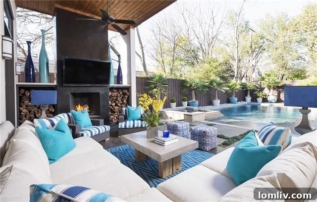 Sparkling swimming pool with water feature and spa in a Preston Hollow luxury home