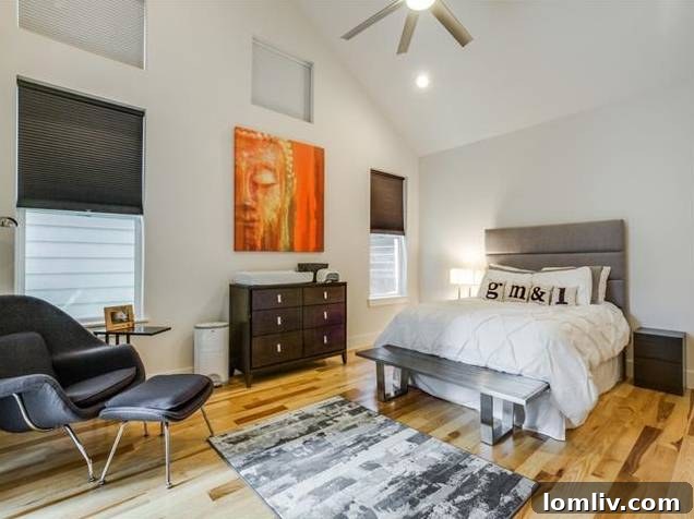East Dallas Modern: Redefining Urban Life 11 Elegant Master Bedroom with Vaulted Ceiling