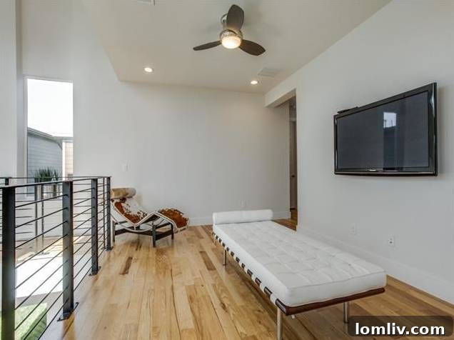 East Dallas Modern: Redefining Urban Life 6 Second Floor Living Area with Flat-Screen TV