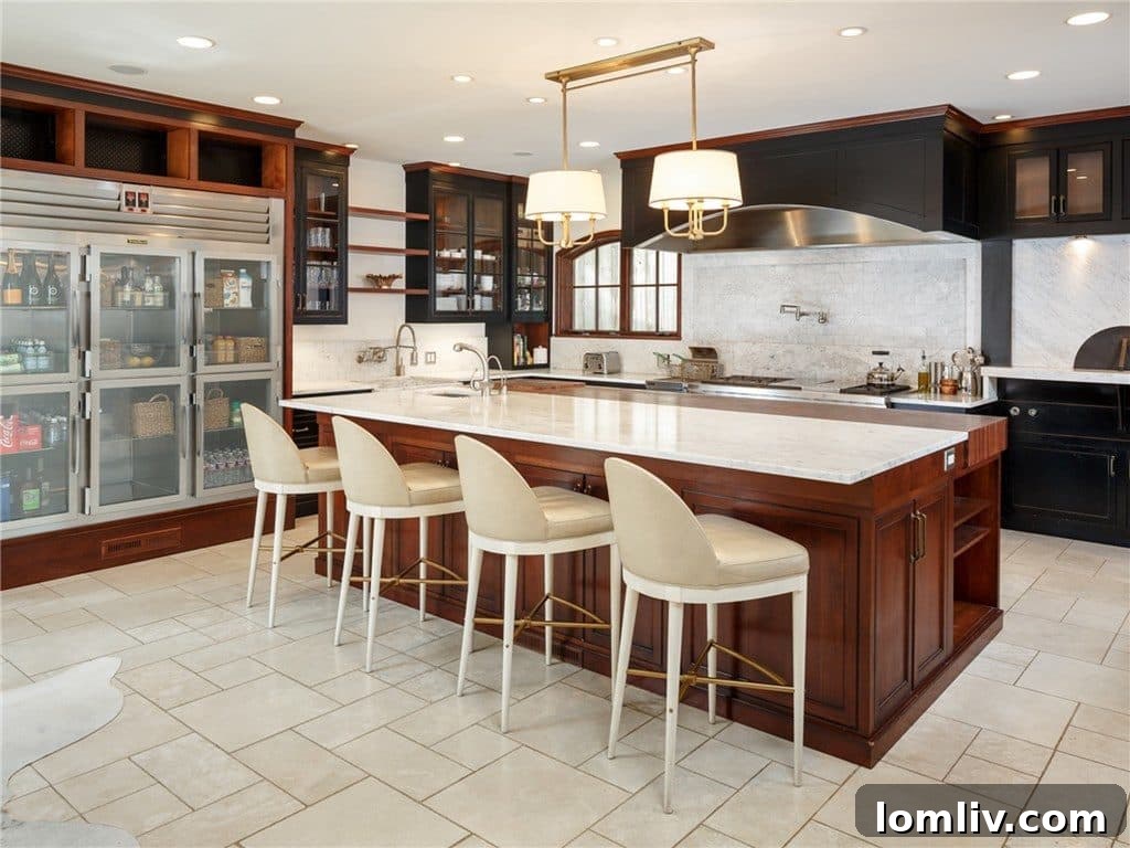Luxurious Kitchen with Baker Chandelier and Marble Countertops