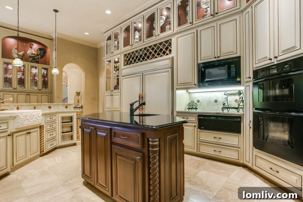 Aledo Ranch: Luxury Equestrian Haven on 20 Acres 6 Spacious Travertine-Floored Kitchen with Thermador Appliances and Bay Window