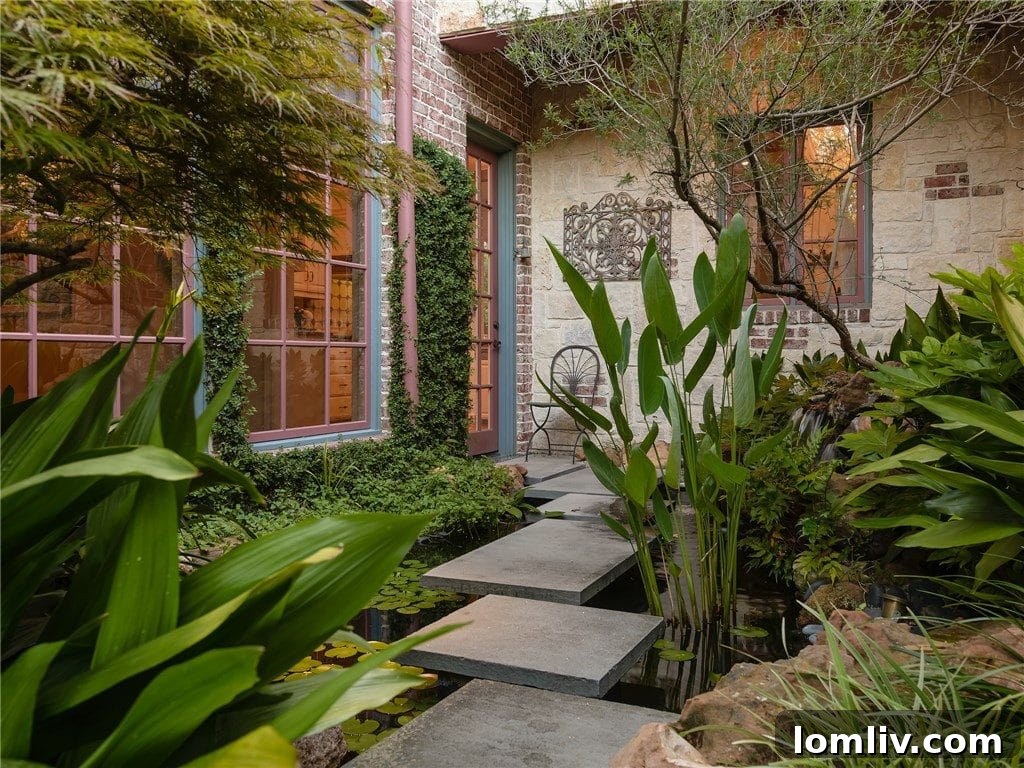 Expansive patio area overlooking the lush backyard and pool