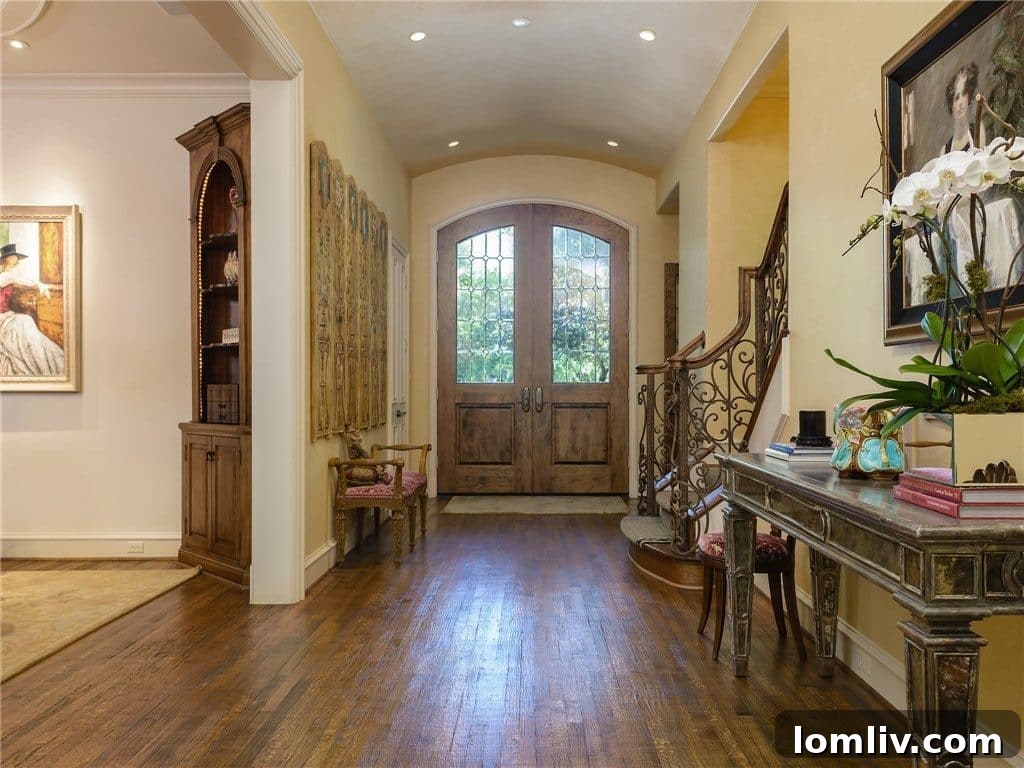 Spacious and bright foyer with high ceilings and sophisticated decor