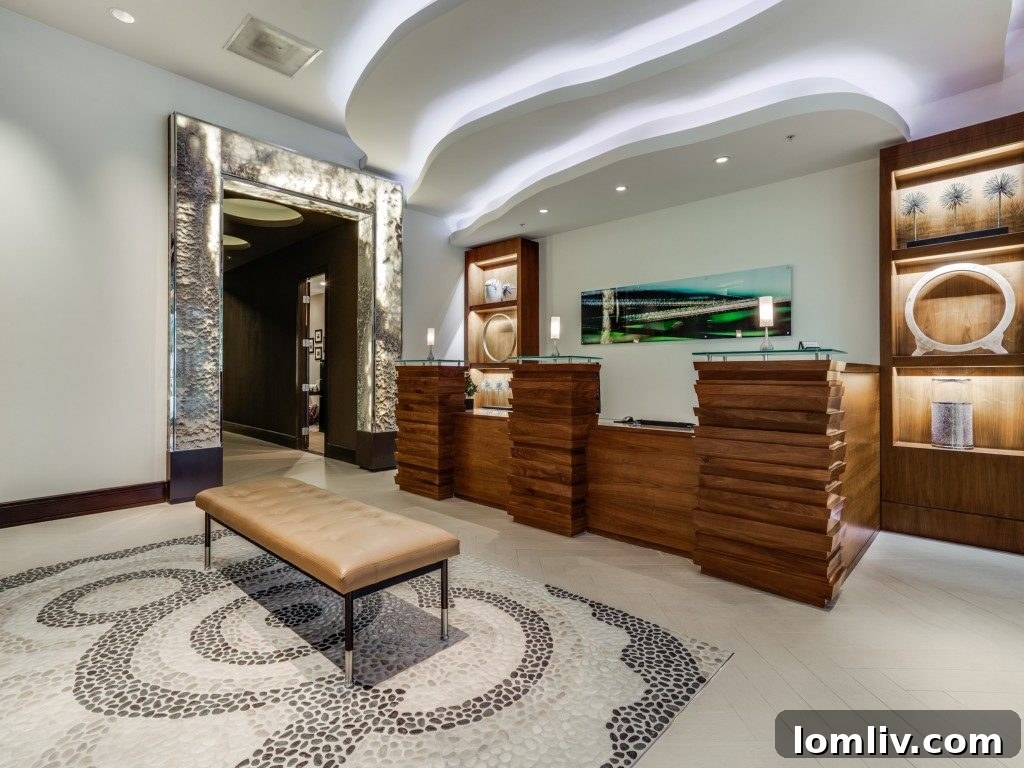 View of the sleek kitchen from the living area, showcasing open-plan design