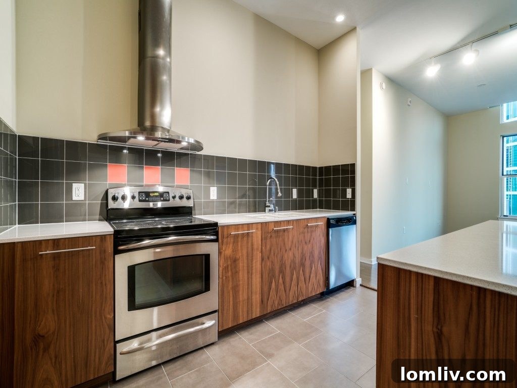 Bright bedroom with large window and modern decor in The Terrace unit