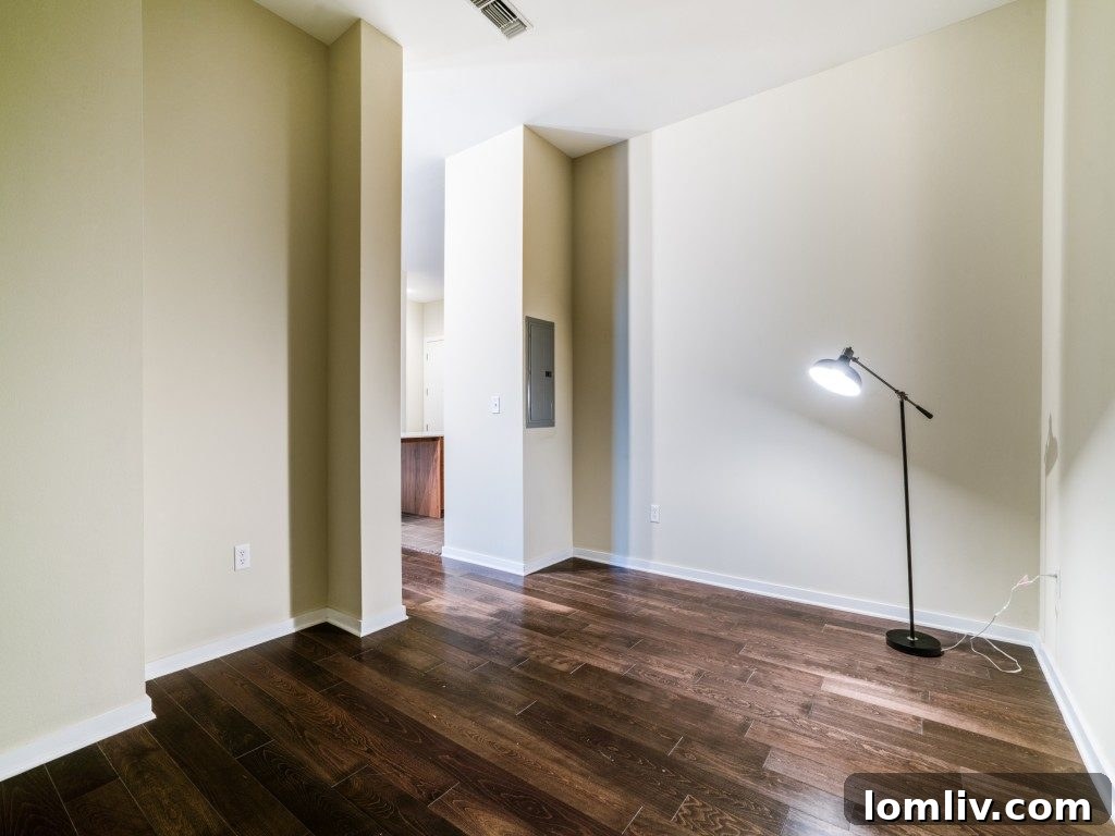 Spacious living room area with sophisticated design elements and city views