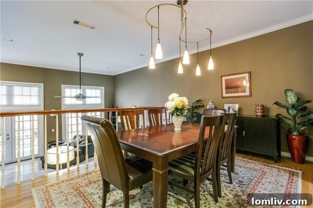 Spacious living area with fireplace and French doors