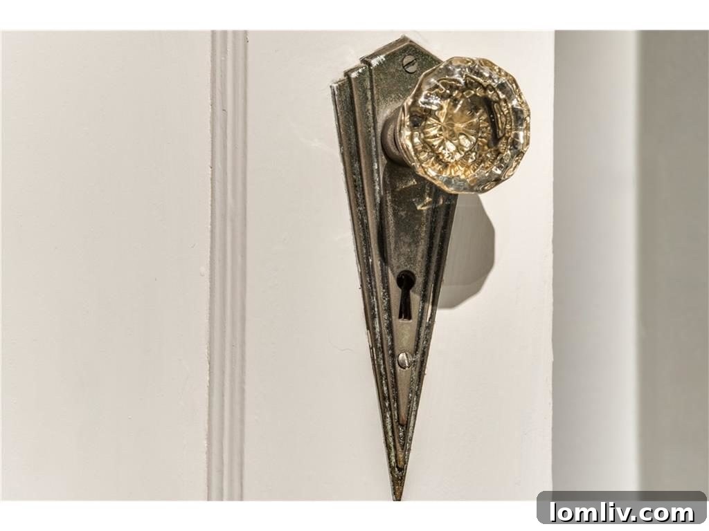 Elegant white subway tile installed vertically, a modern yet classic design choice that adds sophistication and a sense of height to a contemporary bathroom.