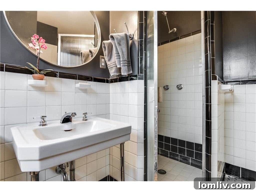 Serene master bedroom with ample natural light pouring through dormer windows, showcasing elegant decor, a comfortable layout, and a peaceful ambiance perfect for relaxation.
