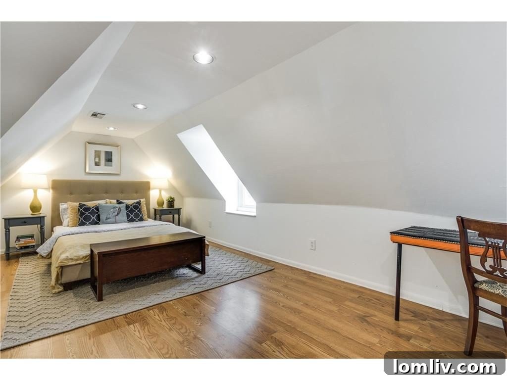 Luxurious master bathroom featuring a stylish double vanity with ample storage, contemporary fixtures, and a bright, inviting atmosphere, perfect for morning routines.