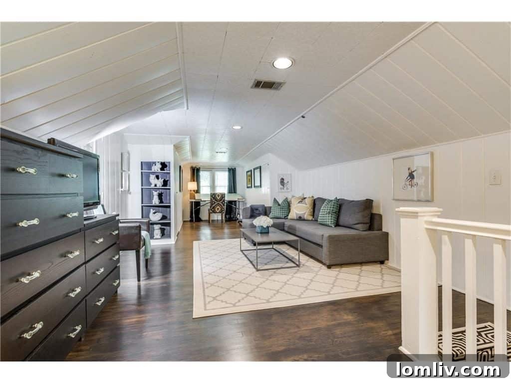 Spacious walk-in shower with exquisite modern tile work, a built-in bench, and high-end rain shower fixtures, offering a luxurious and invigorating bathing experience in the master bathroom.