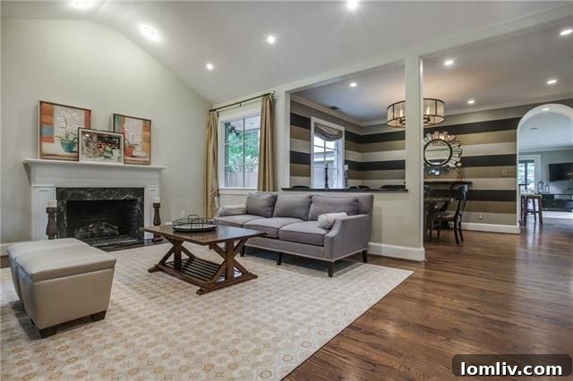 Interior living area with stone fireplace, 6859 Avalon Ave
