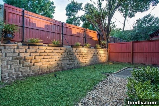 Inviting Exterior and Garden View 6411 Larmanda St