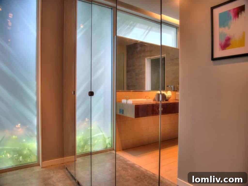 Warm walnut countertops in a luxurious master bathroom
