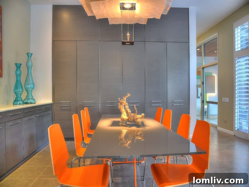 Designer lighting by Ingo Maurer in a modern dining room