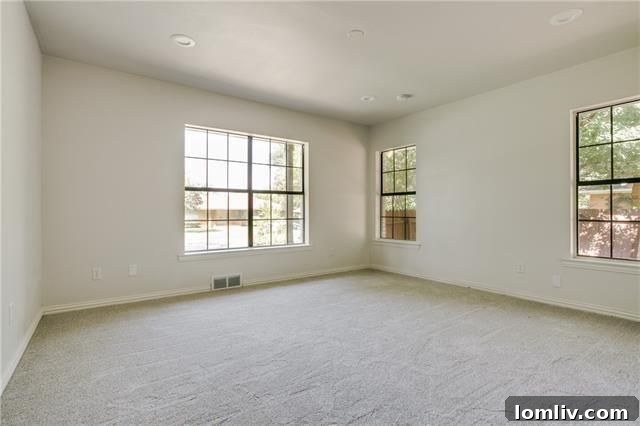 Large grassy backyard with mature trees