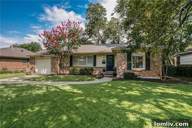 Charming cottage exterior in Richardson's Azalea Park neighborhood