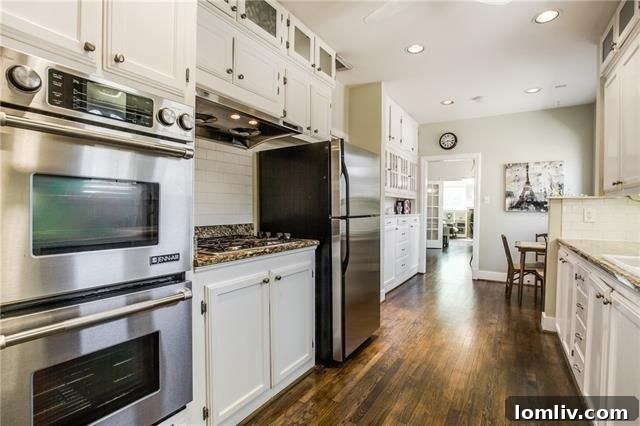Updated kitchen with stainless steel appliances in 6815 Vivian Ave
