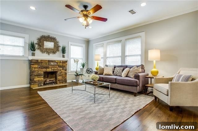 Inviting living room with fireplace and natural light in Kessler Highlands
