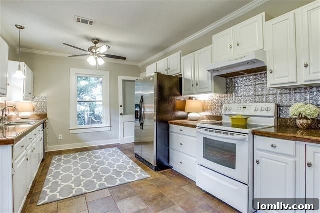 Updated eat-in kitchen with granite counters at 823 Stewart Dr