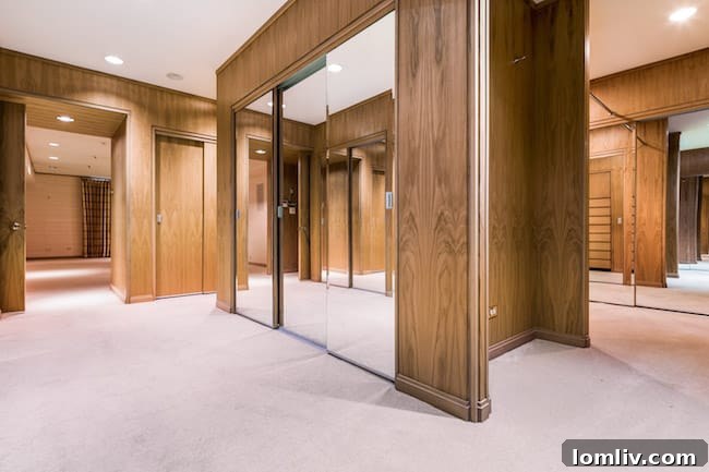Another view of the elegant master bedroom, highlighting its spaciousness and design details