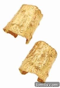 Close-up of the dazzling Gold Cuff Bracelets by Van Cleef & Arpels, gifted by Jacqueline Kennedy Onassis