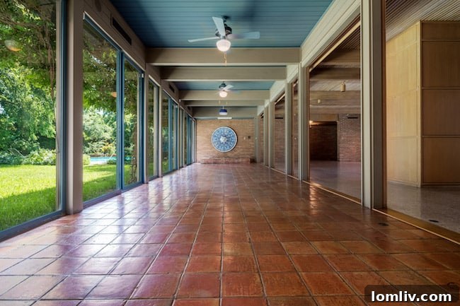 Elegant living and music room interior of the Penson residence, featuring mid-century modern design elements