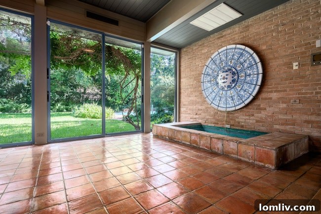 Another perspective of the spacious living and music room in the Penson home, highlighting the architectural flow