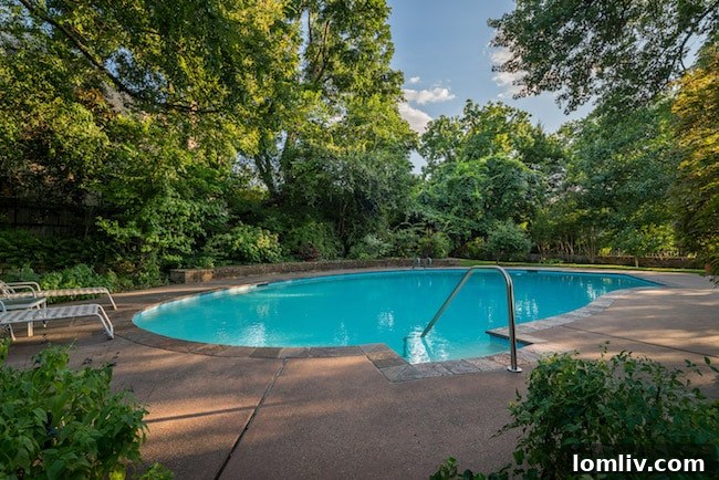 Inviting swimming pool area of the Penson estate, perfectly integrated with the home's exterior design