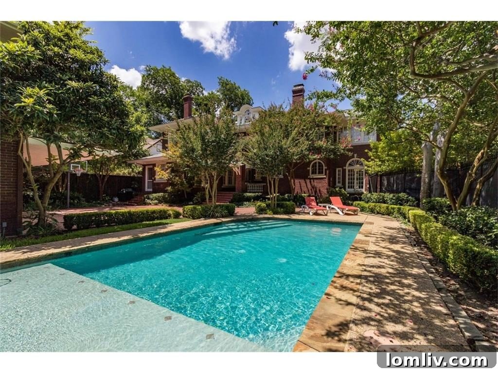 Expansive Backyard with Large Swimming Pool and Lush Landscaping