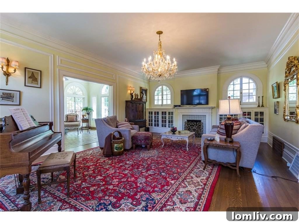 Spacious Living Room with Fireplace and Classic Furnishings