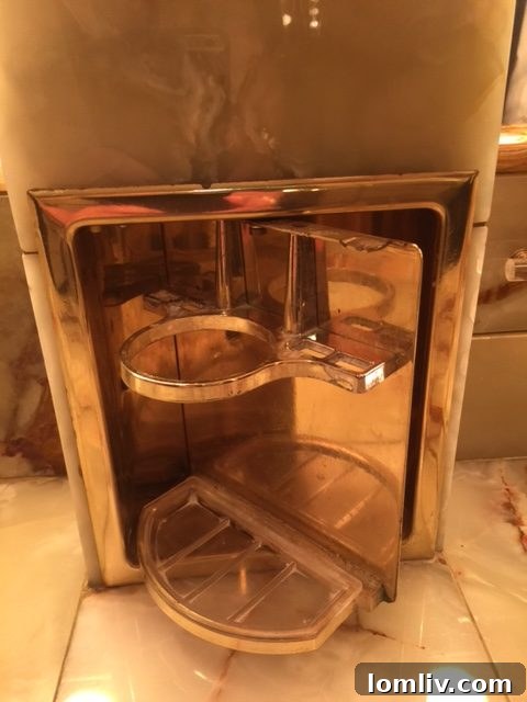 Custom toothbrush and cup holders in gold