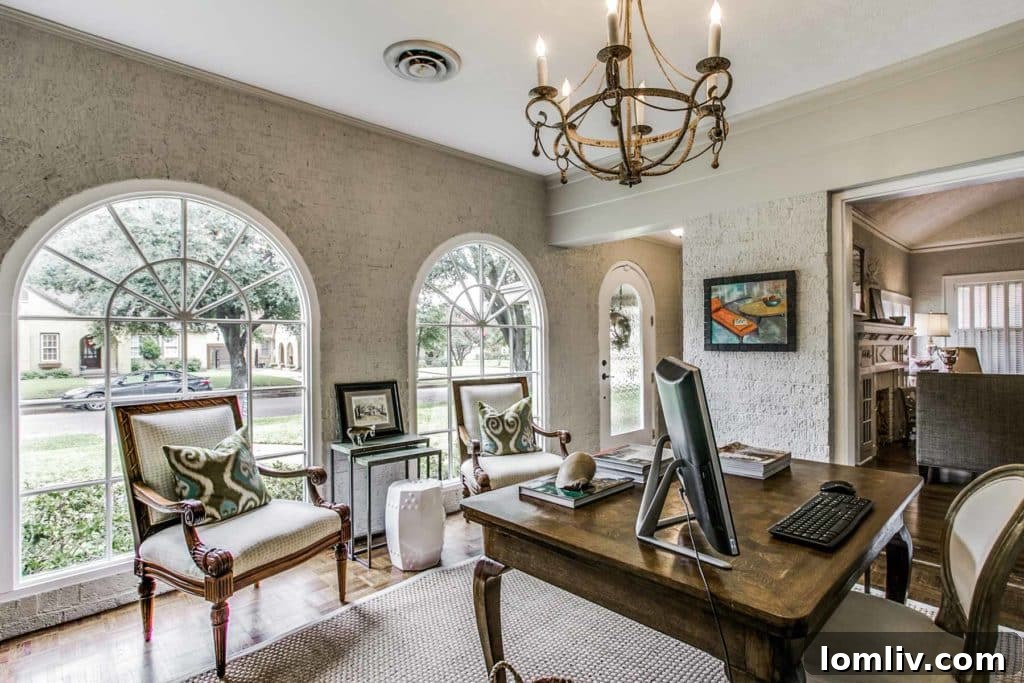 Spacious living room with barrel vaulted ceiling and Craftsman fireplace