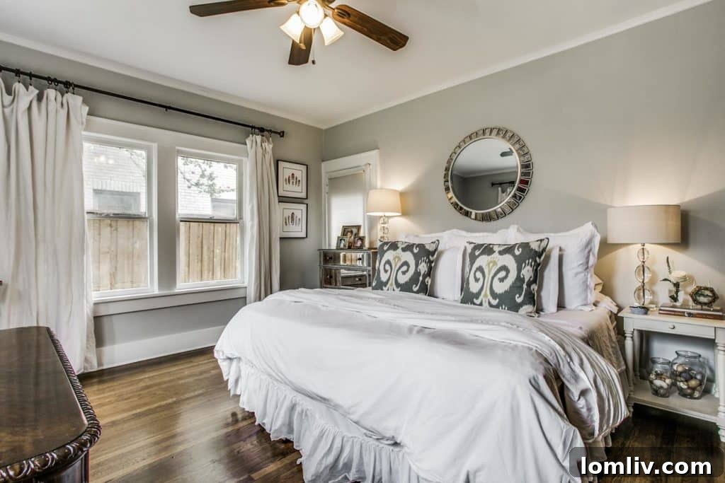 Luxurious master bathroom with large vanity and Carrara marble countertops