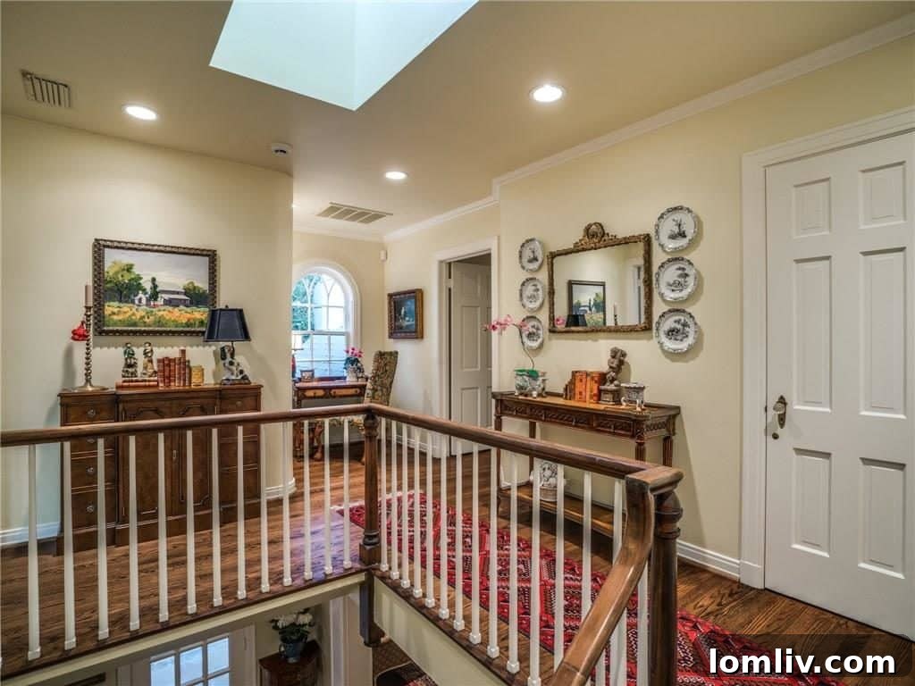 Hallway leading to bedrooms with archways