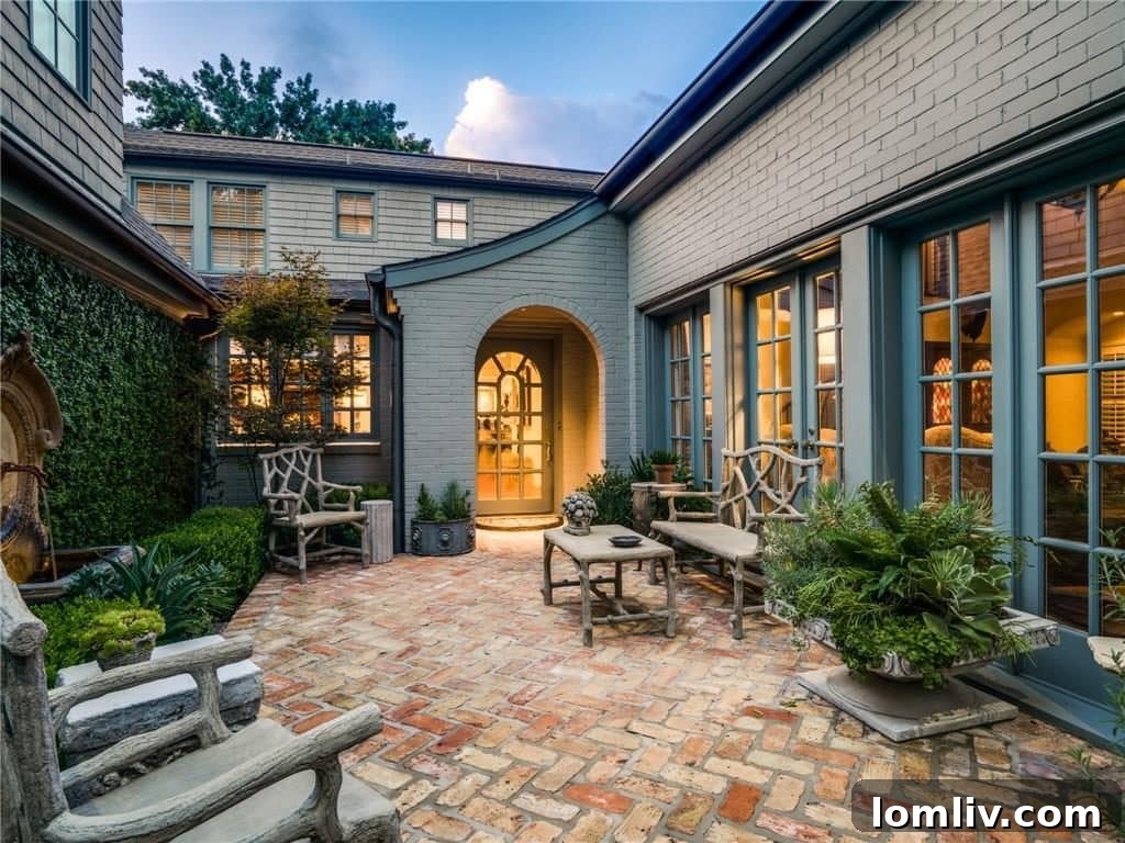 Inviting front courtyard of a luxury Dallas home