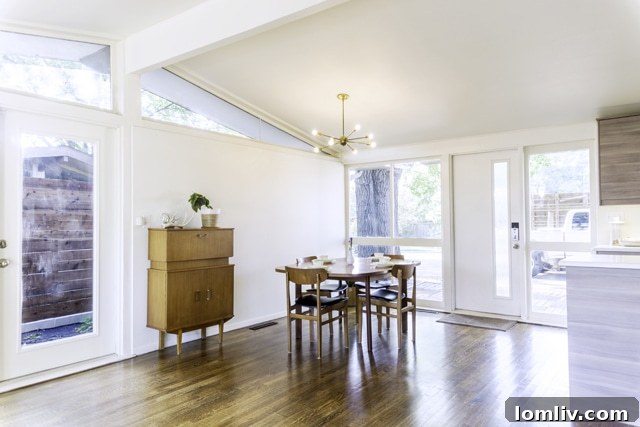 A stylish dining room, perfect for entertaining, featuring elegant midcentury modern touches