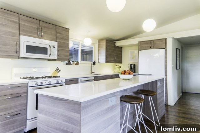 The newly renovated kitchen, featuring stylish cabinetry and modern functionality