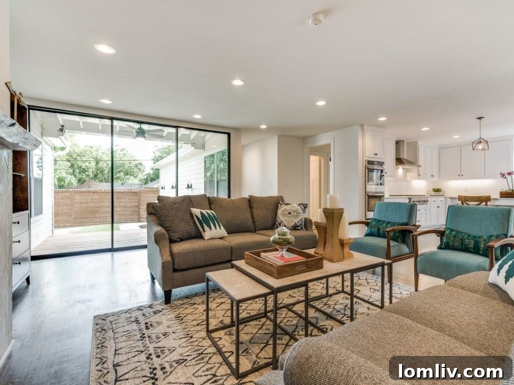 Modern Open Concept Living Area with Stacking Glass Wall